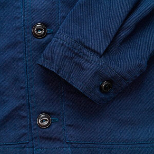 1200x1200 Navy drivers jacket button detail