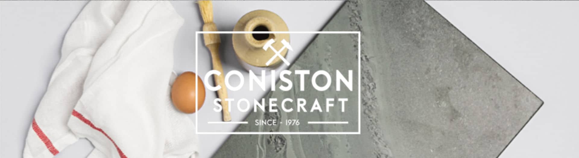 coniston stonecraft header with white log slate mat with egg