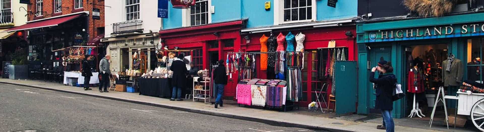 a natiopn of shopkeepers blog header a nation of shopkeepers with a row of coulder shops in notiing hill