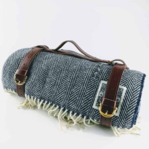 tolly mcrae navy blue chunky picnic blanket, british wool navy blue luxury picnic rug with leather carry handle, luxury green throw