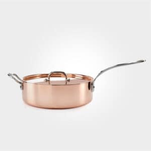 copper saute pan on white background