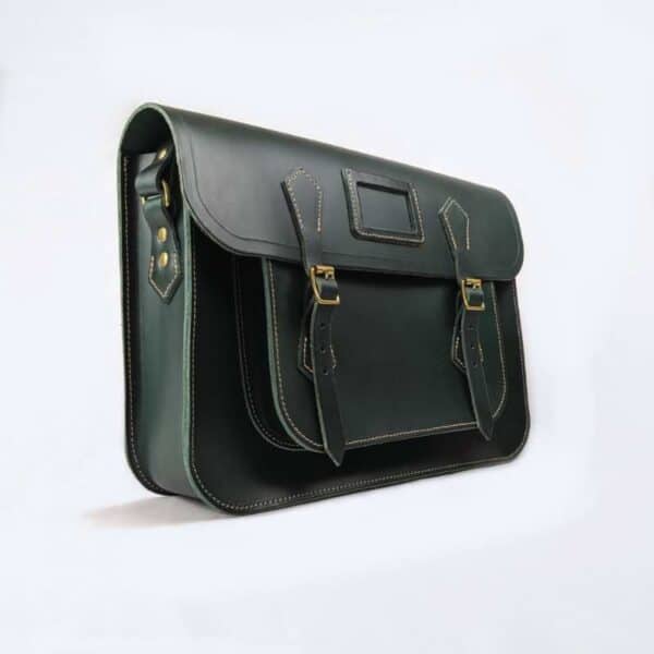 Green leather satchel made in UK on white background