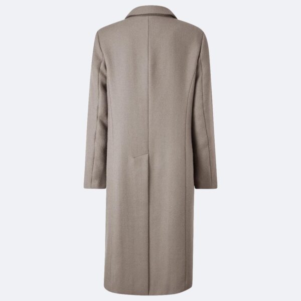 back of a ladies trench coat on grey background British wool