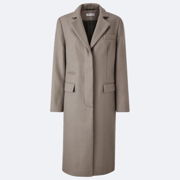 Ladies trench coat on grey background made in Uk from british wool