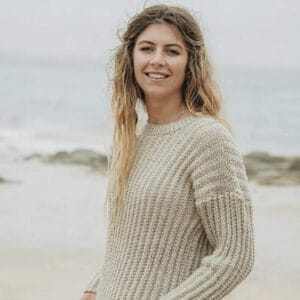 beige lyonesse rib sweater on women on beach made in cornwall