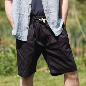 Man wearing Yarmouth oilskin navy shorts