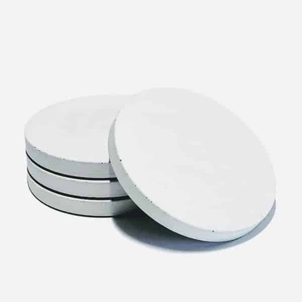 concrete and wax Set of four white concrete coasters, white drinks coasters, made in suffolk, drink coasters