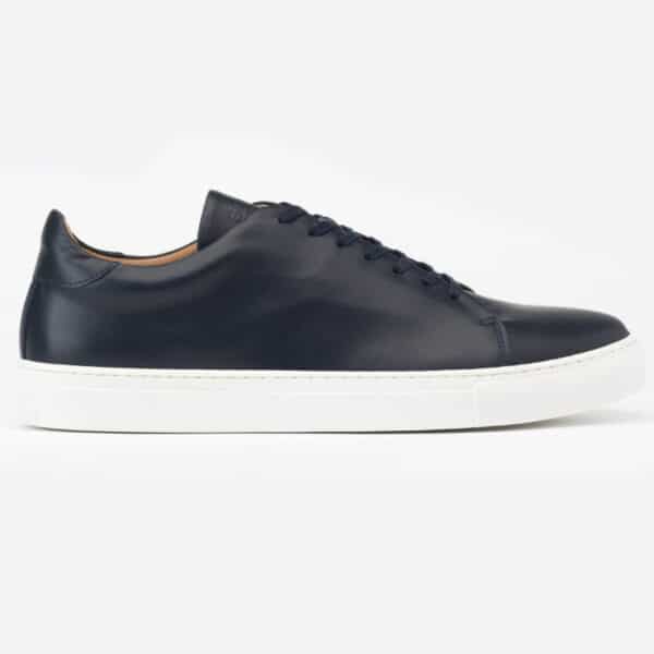 resolable trainers made in UK by Goral in calfskin navy blue made in sheffield on white background