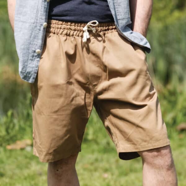 Man wearing Yarmouth oilskins tobacco deck shorts
