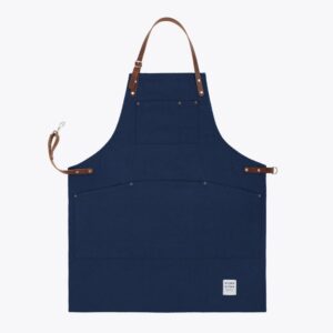navy blue handcrfted in the UK apron on white background