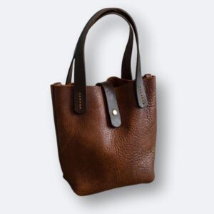 heather borg small bison handbag made in UK handmade leather bag on white background